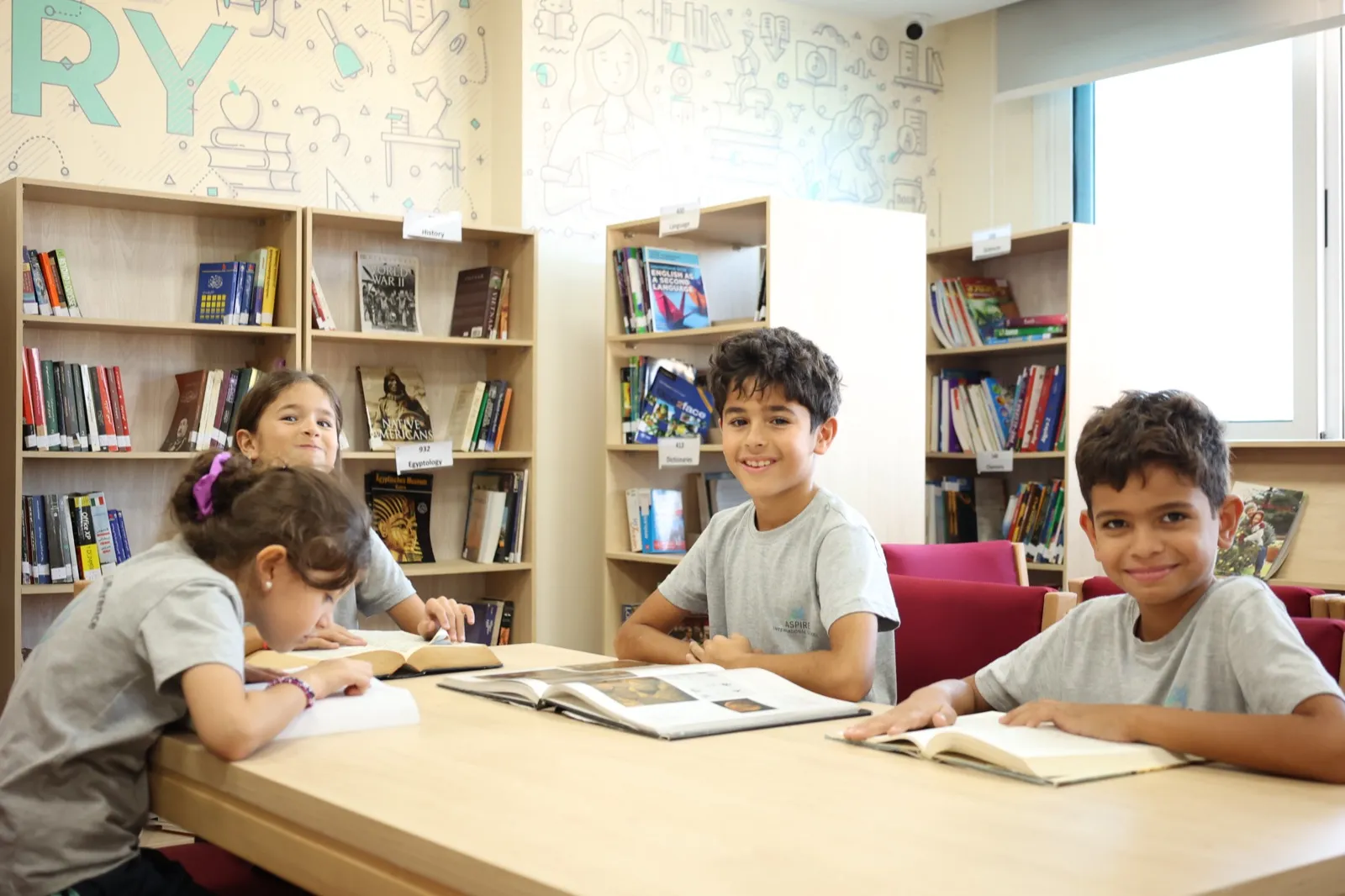 Students reading in the Aspire library